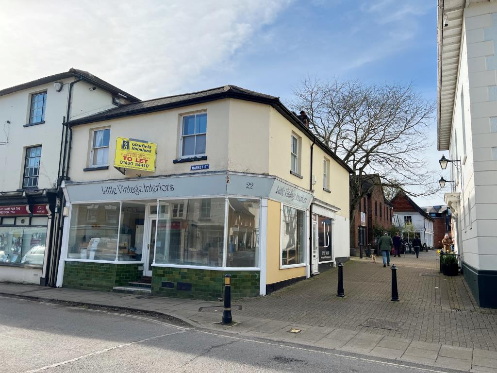 Lot: 5 - FREEHOLD TOWN CENTRE INVESTMENT - Front photo of a pair of shops in Alton Town Centre